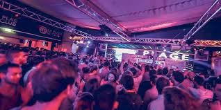 A couple of dancers performs in a night club. A Bordeaux La Plus Grande Discotheque De France