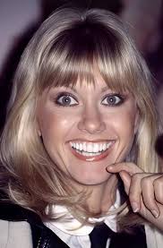 Olivia Newton-John's elegance in 1976 photograph