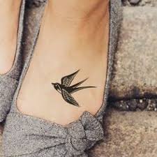 Swallow Bird Tattoo On Hand Meaning 52 Traditional Swallow Tattoo Designs And Meaning Foot Tattoos Bird Tattoo Foot Small Foot Tattoos