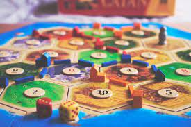 How To Play Settlers Of Catan Board Game Halv Catan Board Game Catan Board Board Games