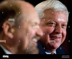 John Weaver , left, President and Chief Executive Officer of  Abitibi-Consolidated and David J. Patterson, right, Chairman, President and  Chief Executive Officer of Bowater hold a press conference to discuss a  merger