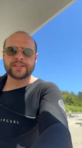 🌊 Catching waves at Long Beach, Tofino! 🏄‍♂️ This place is a surfer'...