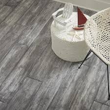 Pergo Portfolio Wetprotect Waterproof Landry Oak 7 48 In W X 4 52 Ft L Embossed Wood Plank Laminate Flooring Lowes Com In 2020 Laminate Flooring Flooring Wood Planks