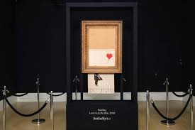 But the shredder built into the frame suddenly stopped halfway through. Banksy Reveals Shredder Malfunction In New Video Art Object