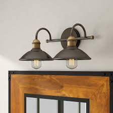 Attached to the bar are two rounded arms that connect to open bulb sockets. Sand Stable Tory 2 Light Olde Bronze Natural Brass Vanity Light Reviews Wayfair