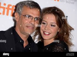 Abdellatif Kechiche and Adele Exarchopoulos attend the photo call of Blue  Is The Warmest Color (La Vie DAdele) at the 2013 Toronto International  Film Festival on September 5, 2013. Photo by Lionel