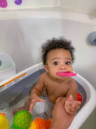 How to give an oatmeal bath. New Mom Must Have Oxo Tot Splash Store Bathtub The Pretty Girls Guide