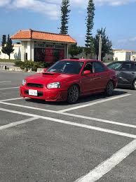 My new to me 2003 Subaru STi Spec C, she isnt perfect but what do you  expect for an almost 18 year old car! It already has a handful of tasteful  mods