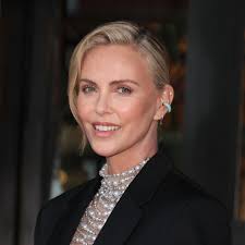 Charlize Theron brings adorable daughter Jackson, 11, as front row date to  fashion show