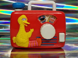 A baby music box toy is not only a great gift for a baby; Vintage Sesame Street Music Box Toy Radio 90s Tyco Jim Henson Etsy Bird Baby Shower Toy Boxes Nostalgia Gift