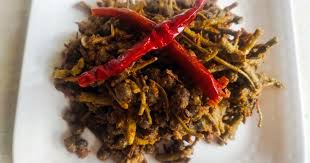 Ker Sangri ki Sabzi, signature desert beans and berries curry, served in a rustic bowl