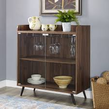 Teak wood is most popular material with naturally pleasing to the eyes and durable design to last quite long period of time. 30 Mid Century Modern Glass Door Bar Cabinet W Metal Legs In Dark Walnut Walker Edison Bu30seadw