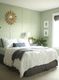 In addition to green walls, this bedroom has a pale green ceiling in a complementary shade, with each portion of the room being separated by thick white trim. Guest Room Reveal Green Bedroom Walls Light Green Bedrooms Bedroom Decor Design