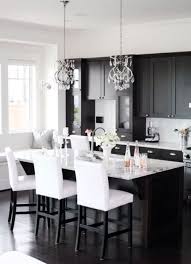 Our dining sets also give you comfort and durability in a big choice of styles. Black And White Dining Table White Kitchen Design Black White Kitchen Black Kitchen Cabinets