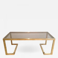 A 1970s original guy lefevre solid brass side table with characteristic floating top with smoked glass top and c. Guy Lefevre 1960 S Guy Lefevere Solid Brass Coffee Table