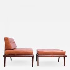 The set is available upholstered in a choice of supple leathers or maharam mohair supreme, a 100 percent mohair textile, which hugs the creases. Mel Smilow Midcentury Walnut And Leather Lounge Chair And Ottoman By Mel Smilow