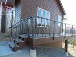 Fascia mounting has the advantage of not puncturing any waterproof membrane deck surface and eliminates any risk of water penetration. Fascia Mounted Aluminum Railing Posts Photo