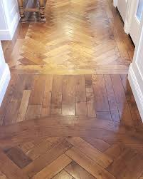 Flooring Can Be As Creative As You Want It To Be Here We Created A Beautiful Entryway With A Long Hall And Circular Section Perfe Flooring Long Hall Circular