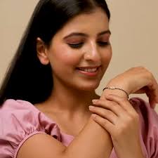 CaratLane Yellow Gold Obi Diamond Mangalsutra Bracelet 14 Karat