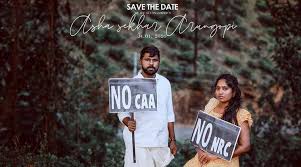 The two are deep in conversation as they hold champagne glasses. This Kerala Couple S Unique Pre Wedding Photoshoot Against Caa And Nrc Is Going Viral Trending News The Indian Express