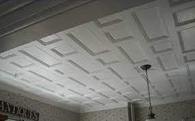 The placement of the strips of wood paneling parallel to the longest wall extends the room. Wainscot Solutions Verdi Style Ceiling Wainscot Solutions Inc