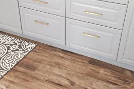 The floor is resistant to water as well as scratches, which makes it a quality. Remodelaholic A New Project With New Luxury Vinyl Wood Plank Floors