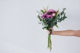 189 608 Hand Holding Flowers Stock Photos Pictures Royalty Free Images Istock Holding Flowers Royalty Free Images Bunch Of Flowers