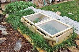 Attach the 2x2s in each corner to align the second and third layers and to fasten everything together. Https Www Motherearthliving Com Gardening Make A Cold Frame For Herbs
