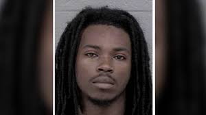 Man wanted for murder of man killed by stray bullet near Charlotte hotel  arrested