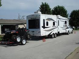 Separate bedroom up front with sliding doors, as well as 2nd exterior entrance into bedroom. Pulling Doubles Montana Owners Club Keystone Montana 5th Wheel Forum