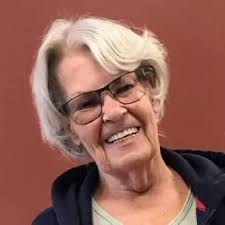 What hairstyle would make thin hair look thicker and healthier for women  over 50?