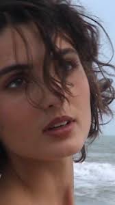 At the 82nd edition of the Venice International Film Festival, actress and  singer Tecla Insolia appeared at the Hotel Excelsior in a Giorgio Armani  dress from the Fall/Winter 1996 collection., Her ...