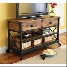 This rustic tv stand has a weathered finish and planked details for tons of coastal farmhouse charm in your living room or bedroom. Black Metal Tv Stand Ideas On Foter