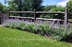 Two men and a little farm split rail fence flowerbed. A Post And Rail Fence And Perennial Planting Traditional Landscape New York By Summerset Gardens Joe Weuste Houzz