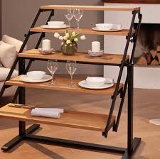 This Amazing Shelf Transforms Into A Dining Table And It S Basically Magic In 2020 Space Saving Dining Table Coffee Table To Dining Table Convertible Furniture
