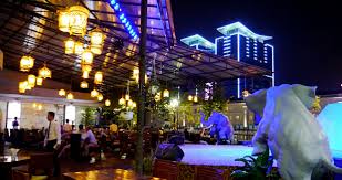 Small and crowded rooftop bar. Rex Hotel S Rooftop Garden Bar In Saigon