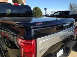 These bed covers fit ford's most popular model pickup truck exactly, and pay for themselves in the long run. Black 2015 F 150 Platinum With Painted To Match Undercover Lux Bed Cover The Best Fit In The Industry Folks Cars Trucks Automotive Industry Undercover