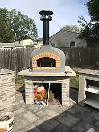 The bull pizza oven range will cook the perfect pizza every time. Outdoor Pizza Oven Wood Fired Insulated W Brick Arch Chimney Buy Online In Guernsey At Guernsey Desertcart Com Productid 11768931