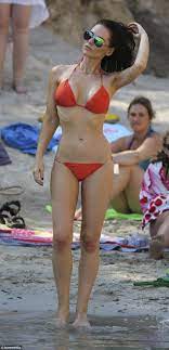 Stephanie Waring shows off incredible figure in red bikini 