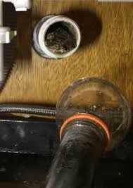 clear a sink clogged past the trap in