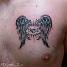 Name In Script With Black And Grey Angel Wings Chest Tattoo By Chris Curtis Angel Wings Chest Tattoo Wings Chest Tattoo Chest Tattoo