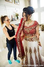 Photo Indian Wedding Bridal Outfit Red White Lengha Bride Hair Indian Wedding Bridal Outfits Indian Bridal Wear Indian Bride And Groom
