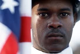 Sergeant (SGT) Darrell Drew of the 4th Transportation Squadron, a member of  the base honor guard, stands at attention beside the national colors during  the welcoming ceremony for the 4th Tactical Fighter