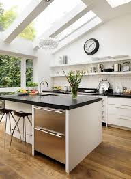 Kitchen skylights not only improve the aesthetics of the room, they are great practical additions that bring in another layer of light. 25 Captivating Ideas For Kitchens With Skylights Kitchen Design Open Skylight Kitchen Contemporary Kitchen