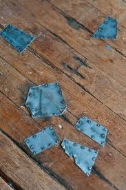 Patching Wood Floors With Metal Saw This At Three Rivers In Copper Looked Really Good Wood Wood Floors Flooring