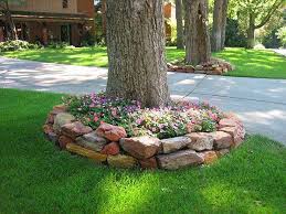 Rocks don't aid plant growth or soil health. 22 Beautiful Flower Beds Around Trees Decor Home Ideas