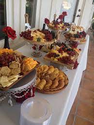 Cheese And Cracker Display Wedding Appetizers Red Flowers Buffet Food Food Platters Wedding Reception Food