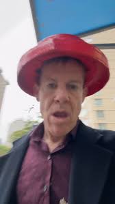 Don’t post and walk. Anyway, enjoy my video. I’m not going to be devote for  Halloween, I’m just wearing this to keep the rain off my head.@