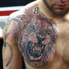 125 Best Lion Tattoos For Men Cool Designs Ideas 2020 Guide Mens Lion Tattoo Lion Head Tattoos Chest Tattoo Men