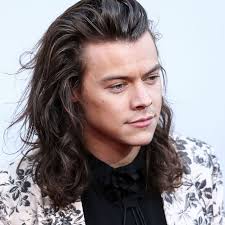 Harry styles has been spotted with long hair. Harry Styles Debuts Terrible New Hat